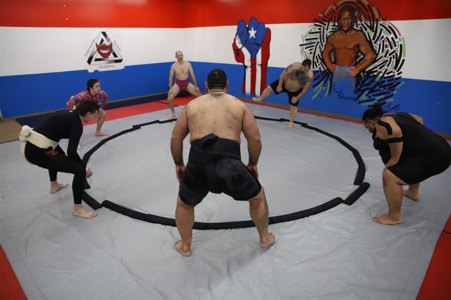 Chicago Sumo Club members practicing around the dohyo